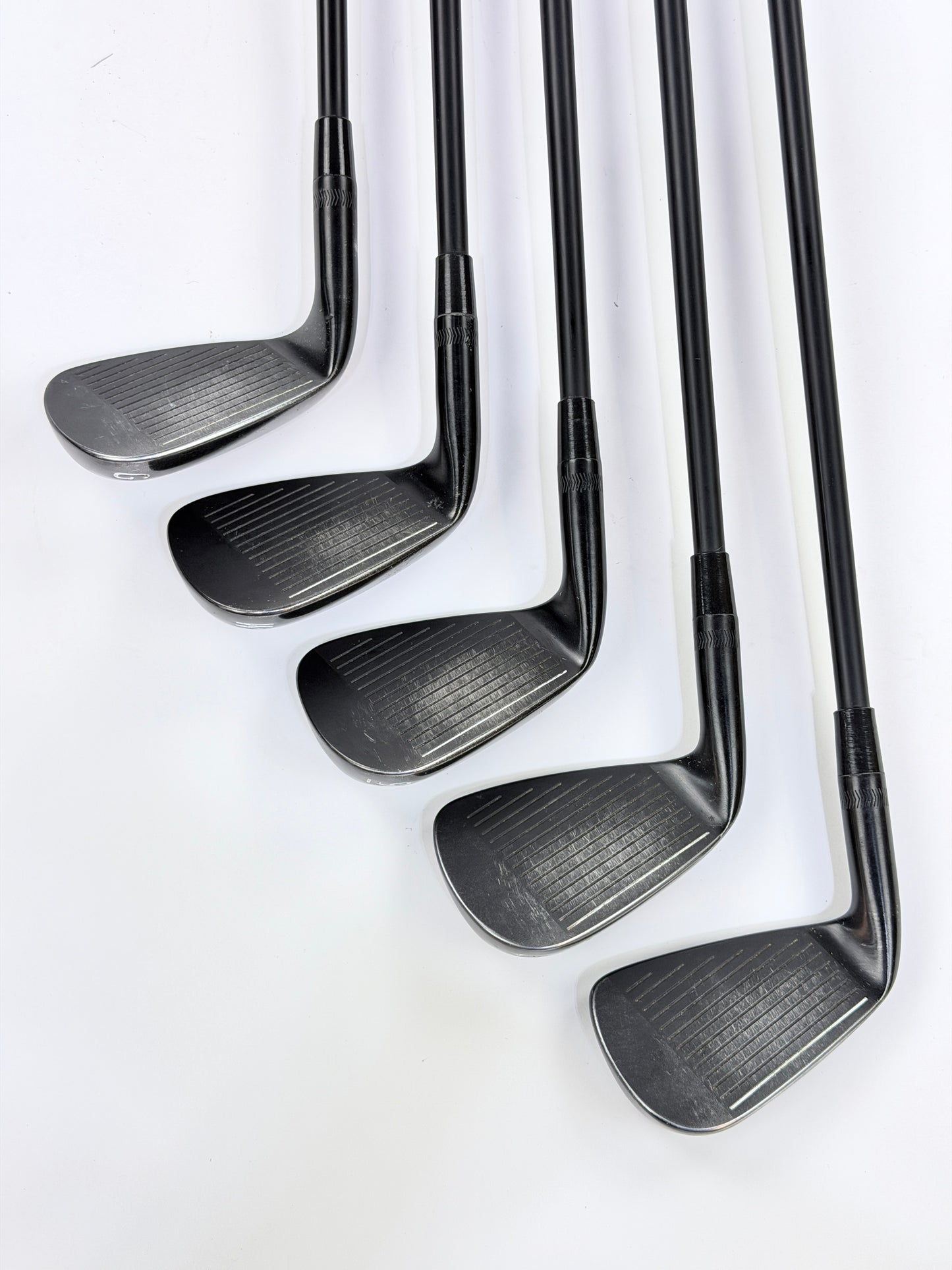 PXG 0317 T BLACK IRON SET 7-PW S FLEX RH +.25